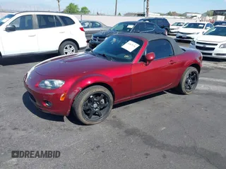 2006 Mazda MX-5 Miata Sport z VIN JM1NC25F260109008, wystawiony jako IAAI lot #42467176 z przebiegiem 139 839 mil mil oraz . Historia ofert i sprzedaży dostępna na DreamBid. Obrazek 2.