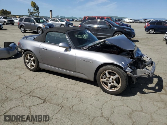 2003 Honda S2000 with VIN JHMAP11483T006461, listed as a Copart auction lot 52099995 with 187,376 mi miles and Salvage Title. Bid and sale history available at DreamBid. Image 4.