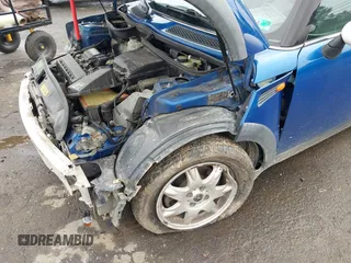 2006 MINI Hardtop with VIN WMWRC33516TK18735, listed as a IAAI auction lot 42519124 with 135,976 mi miles and . Bid and sale history available at DreamBid. Image 6.