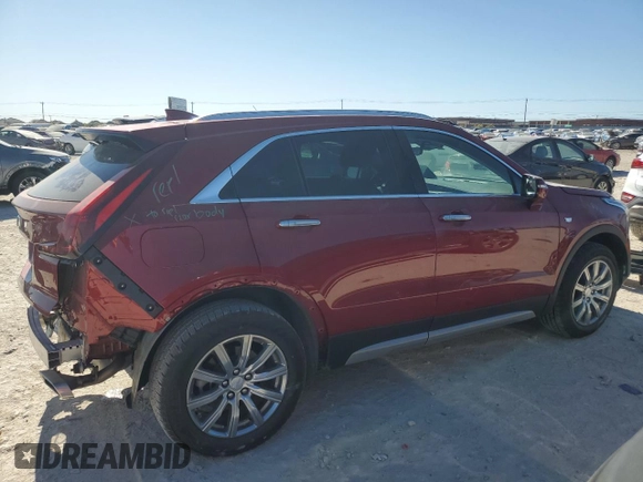 2022 Cadillac XT4 FWD Premium Luxury with VIN 1GYFZCR43NF154997, listed as a Copart auction lot 81942214 with 22,697 mi miles and Salvage title. Bid and sale history available at DreamBid. Image 3.