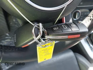 2018 Audi Q3 Premium Plus z VIN WA1JCCFS8JR023281, wystawiony jako IAAI lot #42071289 z przebiegiem 71 335 mil mil oraz . Historia ofert i sprzedaży dostępna na DreamBid. Obrazek 11.