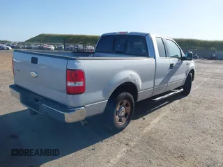 2004 Ford F-150 XL with VIN 1FTPX12594NA32477, listed as a IAAI auction lot 42088113 with 266,389 mi miles. Bid and sale history available at carsss.com. Image 4.