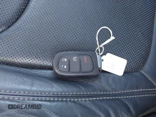 2015 Jeep Cherokee Limited with VIN 1C4PJMDS2FW523024, listed as a IAAI auction lot 41745699 with Not Provided miles and . Bid and sale history available at DreamBid. Image 11.