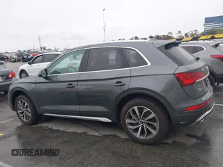 2023 Audi Q5 S line Premium Plus z VIN WA1EAAFY7P2178566, wystawiony jako IAAI lot #41734994 z przebiegiem Nie podano mil oraz . Historia ofert i sprzedaży dostępna na DreamBid. Obrazek 14.