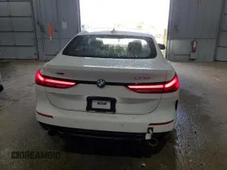 2022 BMW 2 Series 228i xDrive with VIN WBA73AK01N7K47824, listed as a Copart auction lot 74528864 with 64,912 mi miles and Salvage Title. Bid and sale history available at carsss.com. Image 6.