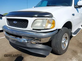 1998 Ford F-150 XL with VIN 1FTZX072XWKA12003, listed as a IAAI auction lot 41765328 with 119,445 mi miles and . Bid and sale history available at DreamBid. Image 6.