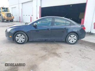 2014 Chevrolet Cruze LS with VIN 1G1PA5SH1E7437248, listed as a IAAI auction lot 42228070 with 128,427 mi miles and . Bid and sale history available at DreamBid. Image 14.