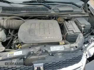 2018 Dodge Grand Caravan SE Plus z VIN 2C4RDGBG8JR181032, wystawiony jako Copart lot #59388195 z przebiegiem 73 817 mil mil oraz Szkoda całkowita • Salvage title. Historia ofert i sprzedaży dostępna na DreamBid. Obrazek 14.