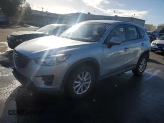 2016 Mazda CX-5 Sport with VIN JM3KE2BEXG0904597, listed as a Copart auction lot 86293834 with 63,343 mi miles and Salvage Title. Bid and sale history available at carsss.com. Image 1.