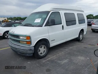 1999 Chevrolet Express with VIN 1GBFG15R5X1075479, listed as a IAAI auction lot 41729007 with 113,579 mi miles and . Bid and sale history available at carsss.com. Image 2.