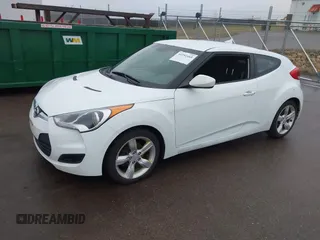 2013 Hyundai Veloster w/Gray Int with VIN KMHTC6AD8DU171050, listed as a IAAI auction lot 41992468 with 186,714 mi miles and . Bid and sale history available at DreamBid. Image 2.
