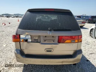 2003 Honda Odyssey LX z VIN 5FNRL18503B004270, wystawiony jako Copart lot #50307625 z przebiegiem 93 822 mil mil oraz Szkody całkowita. Historia ofert i sprzedaży dostępna na DreamBid. Obrazek 6.