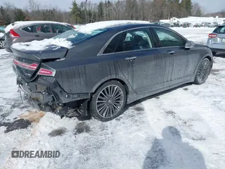 2015 Lincoln MKZ z VIN 3LN6L2J99FR606377, wystawiony jako IAAI lot #41597537 z przebiegiem 110 746 mil mil oraz . Historia ofert i sprzedaży dostępna na DreamBid. Obrazek 4.