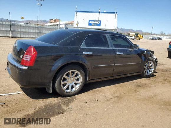 2005 Chrysler 300 with VIN 2C3AA63H35H518844, listed as a Copart auction lot 52188995 with 201,445 mi miles and Salvage Title. Bid and sale history available at carsss.com. Image 3.