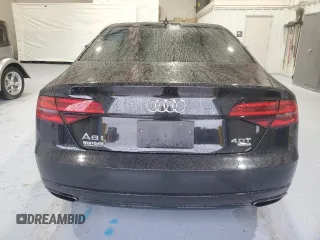 2017 Audi A8 Sport z VIN WAU43AFD4HN020515, wystawiony jako Copart lot #44953055 z przebiegiem 115 422 mil mil oraz Szkody całkowita. Historia ofert i sprzedaży dostępna na DreamBid. Obrazek 6.
