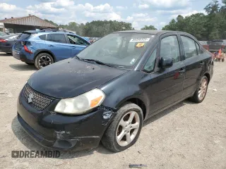 2011 Suzuki SX4 LE z VIN JS2YC5A24B6301058, wystawiony jako Copart lot #59390325 z przebiegiem Nie podano mil oraz Czysty tytuł • Clean title. Historia ofert i sprzedaży dostępna na DreamBid. Obrazek 1.