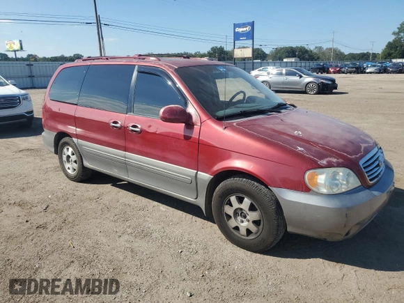 2003 Kia Sedona LX with VIN KNDUP131236411909, listed as a Copart auction lot 73715384 with 179,642 mi miles and Salvage Title. Bid and sale history available at carsss.com. Image 4.
