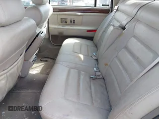 1995 Cadillac Concours z VIN 1G6KF52YXSU302434, wystawiony jako IAAI lot #42231281 z przebiegiem 153 236 mil mil oraz . Historia ofert i sprzedaży dostępna na DreamBid. Obrazek 8.
