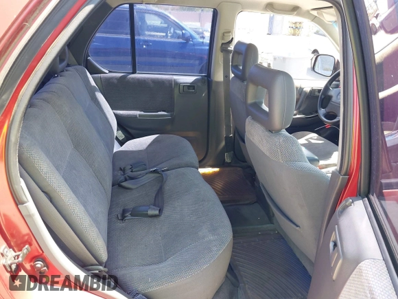 1999 Isuzu Rodeo S z VIN 4S2CK58WXX4346156, wystawiony jako IAAI lot #42328951 z przebiegiem 196 182 mil mil oraz . Historia ofert i sprzedaży dostępna na DreamBid. Obrazek 8.