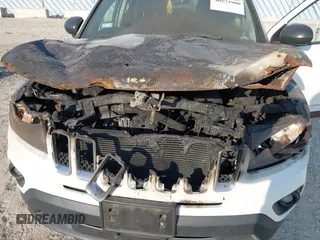 2014 Jeep Compass Sport with VIN 1C4NJDBB3ED892141, listed as a IAAI auction lot 40572980 with 95,826 mi miles. Bid and sale history available at carsss.com. Image 6.