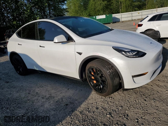 2022 Tesla Model Y Long Range with VIN 7SAYGAEE7NF376795, listed as a Copart auction lot 55113135 with 66,796 mi miles and Salvage Title. Bid and sale history available at carsss.com. Image 4.