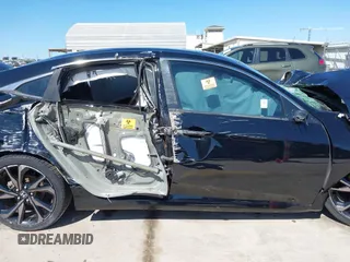 2019 Honda Civic Sport with VIN 19XFC2F89KE051016, listed as a IAAI auction lot 42042322 with 36,775 mi miles and . Bid and sale history available at DreamBid. Image 12.