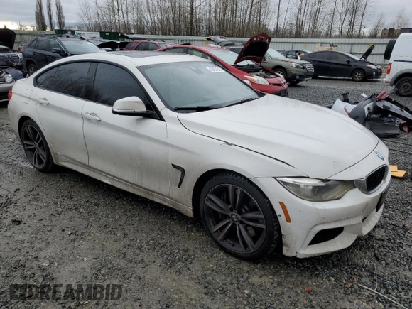 2015 BMW 4 Series 435i xDrive with VIN WBA4B3C56FD669599, listed as a Copart auction lot 43461545 with 186,082 mi miles and Salvage title. Bid and sale history available at DreamBid. Image 4.