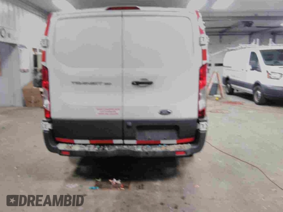 2018 Ford Transit z VIN 1FTYE1YM6JKB22823, wystawiony jako IAAI lot #42514705 z przebiegiem 147 895 mil mil oraz . Historia ofert i sprzedaży dostępna na DreamBid. Obrazek 5.