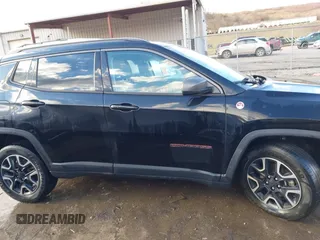 2019 Jeep Compass Trailhawk with VIN 3C4NJDDBXKT671364, listed as a IAAI auction lot 41655974 with 104,252 mi miles and . Bid and sale history available at carsss.com. Image 14.