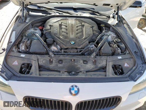 2016 BMW 5 Series 550i xDrive с VIN WBAKP9C50GD980815, выставлен на аукционе Copart как лот 56858035 с пробегом 75 485 миль миль и Списание • Salvage title. История ставок и продаж доступна на DreamBid. Изображение 11.