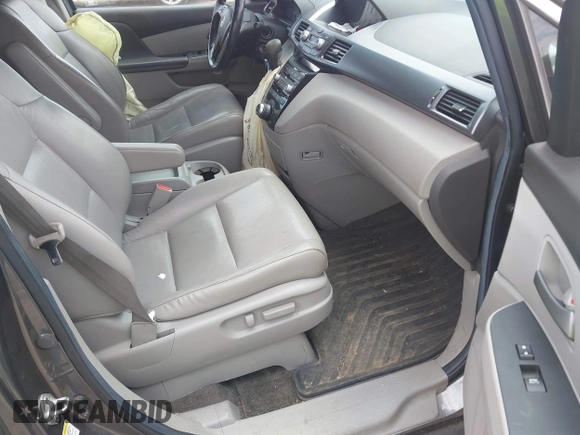 2012 Honda Odyssey Touring with VIN 5FNRL5H90CB045430, listed as a IAAI auction lot 42079770 with 113,901 mi miles and . Bid and sale history available at DreamBid. Image 5.
