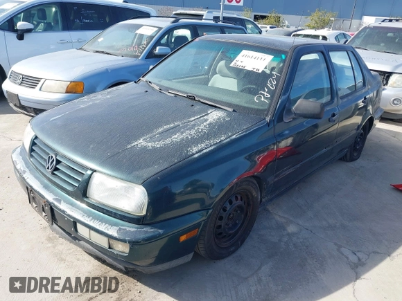 1998 Volkswagen Jetta z VIN 3VWRF61H5WM228558, wystawiony jako IAAI lot #41614111 z przebiegiem 198 205 mil mil oraz . Historia ofert i sprzedaży dostępna na DreamBid. Obrazek 2.