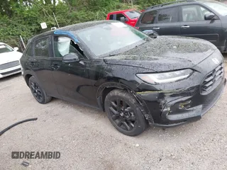 2024 Honda HR-V Sport z VIN 3CZRZ2H57RM701390, wystawiony jako IAAI lot #42235082 z przebiegiem 10 001 mil mil oraz . Historia ofert i sprzedaży dostępna na DreamBid. Obrazek 1.