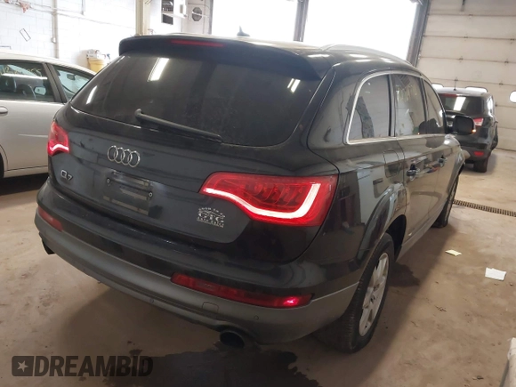 2013 Audi Q7 3.0T Premium Plus with VIN WA1LGAFE6DD000112, listed as a IAAI auction lot 41229774 with 149,122 mi miles. Bid and sale history available at carsss.com. Image 4.