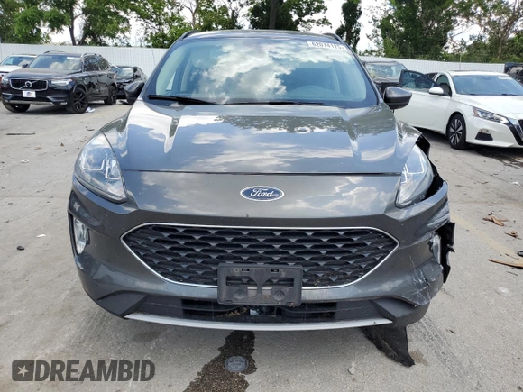 2020 Ford Escape SEL с VIN 1FMCU9H62LUB03461, выставлен на аукционе Copart как лот 62074125 с пробегом 104 462 миль миль и Списание • Salvage title. История ставок и продаж доступна на DreamBid. Изображение 5.