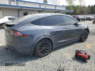 2016 Tesla Model X 70D z VIN 5YJXCBE23GF005295, wystawiony jako Copart lot #51034005 z przebiegiem 130 325 mil mil oraz Szkody całkowita. Historia ofert i sprzedaży dostępna na DreamBid. Obrazek 3.