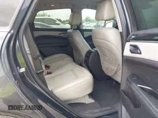 2014 Cadillac SRX Luxury Collection with VIN 3GYFNBE33ES599058, listed as a IAAI auction lot 42080556 with 128,917 mi miles. Bid and sale history available at carsss.com. Image 8.