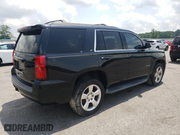 2015 Chevrolet Tahoe LT с VIN 1GNSCBKC6FR672045, выставлен на аукционе Copart как лот 56657825 с пробегом 96 871 миль миль и Списание • Salvage title. История ставок и продаж доступна на DreamBid. Изображение 3.