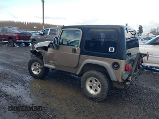 2004 Jeep Wrangler Sport with VIN 1J4FA49S94P711531, listed as a IAAI auction lot 41306863 with 143,720 mi miles and . Bid and sale history available at DreamBid. Image 3.