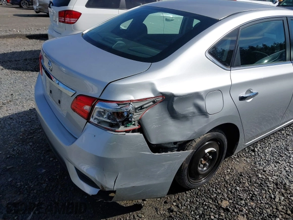 2018 Nissan Sentra S with VIN 3N1AB7AP6JY292055, listed as a IAAI auction lot 41883754 with 65,703 mi miles and . Bid and sale history available at DreamBid. Image 6.