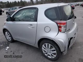 2012 Scion iQ with VIN JTNJJXB03CJ018641, listed as a Copart auction lot 82653104 with 118,617 mi miles and Salvage Title. Bid and sale history available at carsss.com. Image 2.
