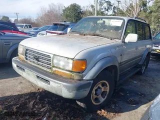 1997 Toyota Land Cruiser with VIN JT3HJ85J0V0186845, listed as a IAAI auction lot 41216993 with 278,082 mi miles. Bid and sale history available at carsss.com. Image 2.