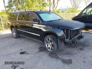 2015 Cadillac Escalade ESV Premium z VIN 1GYS4JKJXFR291842, wystawiony jako IAAI lot #41235490 z przebiegiem 115 037 mil mil oraz . Historia ofert i sprzedaży dostępna na DreamBid. Obrazek 1.
