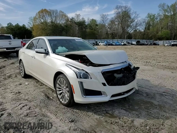 2014 Cadillac CTS Luxury AWD z VIN 1G6AX5SXXE0155317, wystawiony jako Copart lot #53205315 z przebiegiem 83 719 mil mil oraz Szkoda całkowita • Salvage title. Historia ofert i sprzedaży dostępna na DreamBid. Obrazek 11.