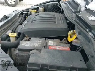 2014 Dodge Grand Caravan SXT with VIN 2C4RDGBGXER138141, listed as a IAAI auction lot 41201505 with 156,445 mi miles and . Bid and sale history available at DreamBid. Image 19.