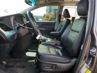 2017 Toyota Sienna SE with VIN 5TDXZ3DCXHS771231, listed as a Copart auction lot 50169225 with 81,910 mi miles and Salvage Title. Bid and sale history available at carsss.com. Image 7.