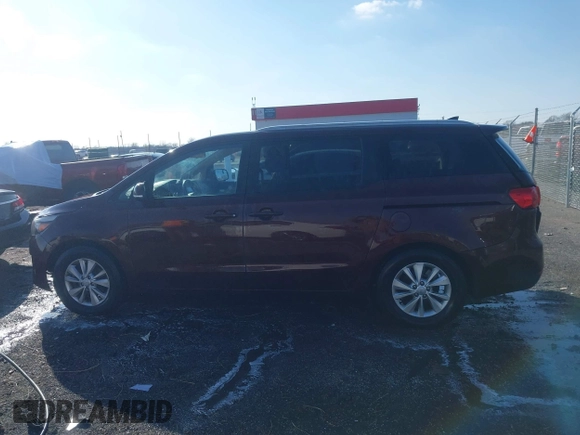 2015 Kia Sedona LX with VIN KNDMB5C14F6059569, listed as a IAAI auction lot 41564739 with 167,275 mi miles. Bid and sale history available at carsss.com. Image 14.
