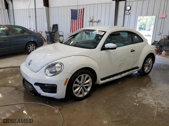 2017 Volkswagen Beetle 1.8T S with VIN 3VWF17AT5HM617358, listed as a Copart auction lot 66074204 with 95,588 mi miles and Salvage Title. Bid and sale history available at carsss.com. Image 1.