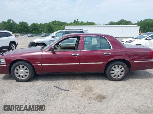 2005 Mercury Grand Marquis LS Premium z VIN 2MEHM75W05X636003, wystawiony jako IAAI lot #42480277 z przebiegiem 224 789 mil mil oraz . Historia ofert i sprzedaży dostępna na DreamBid. Obrazek 15.