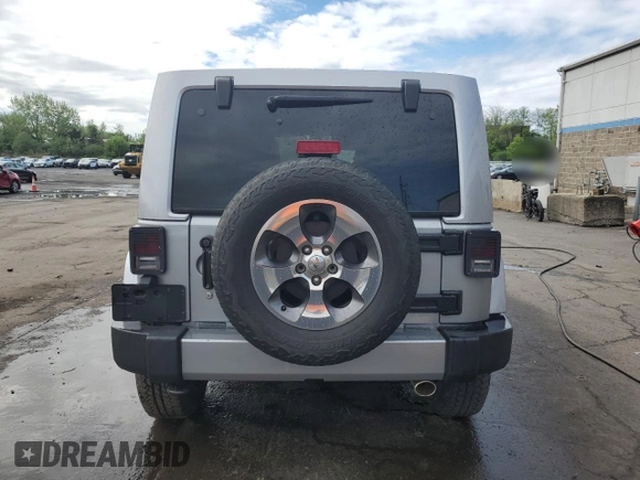 2016 Jeep Wrangler Unlimited 75th Anniversary with VIN 1C4HJWEG1GL183099, listed as a Copart auction lot 55393385 with Not provided miles and Salvage title. Bid and sale history available at DreamBid. Image 6.